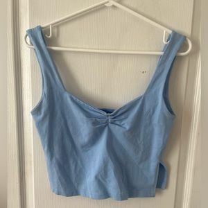 Blue tank with slits